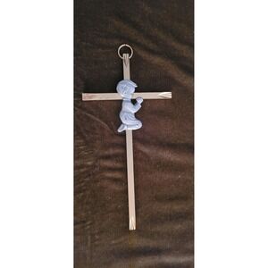 Brass and pewter cross with praying baby boy
